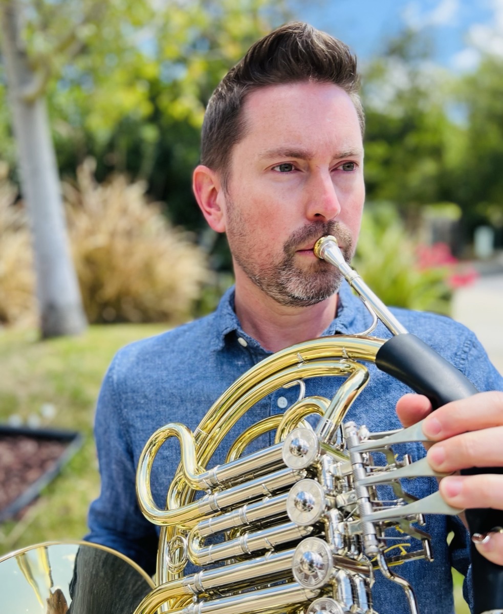 J.R. Hills playing French horn