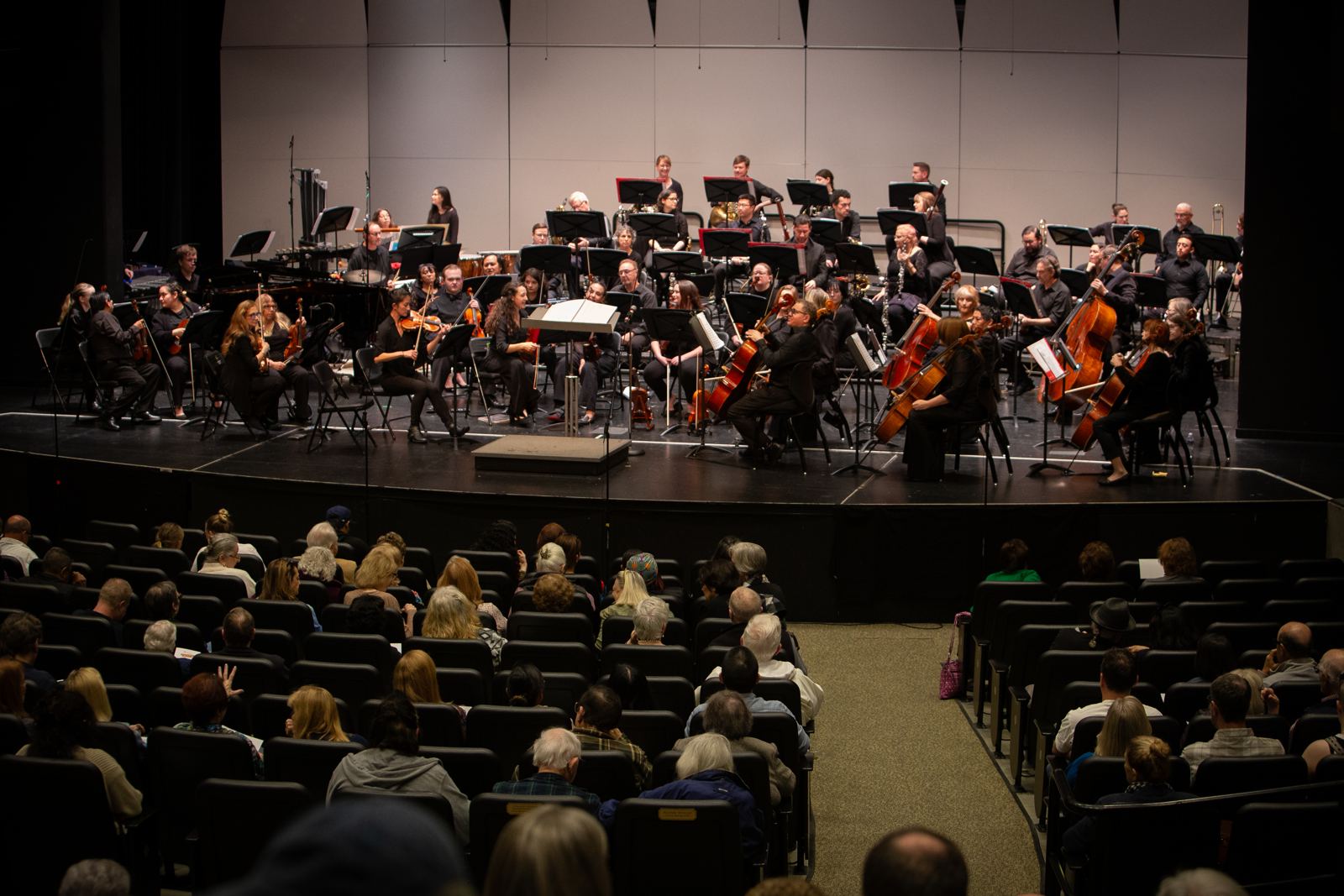 The full SCSO on stage in front of a packed audience at Canyon High School PAC